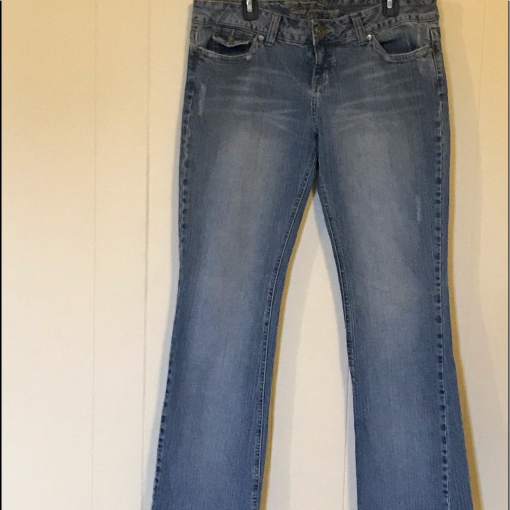 Faded slightly distressed bluejeans.